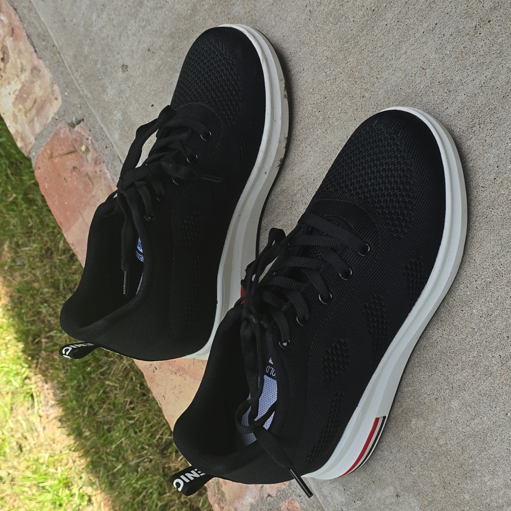 Women's sporty tennis shoes with 1 1/2 inch heel.